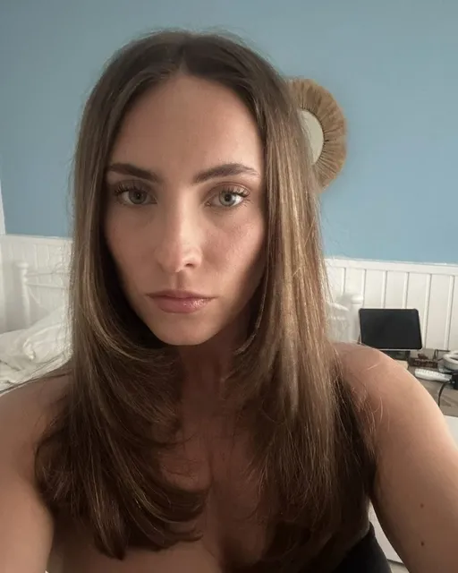 Butterfly face-framing layers in long brunette hair