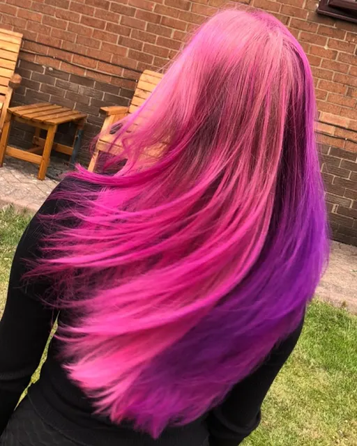 Long hair in hot pink and amethyst purple, half-and-half colour